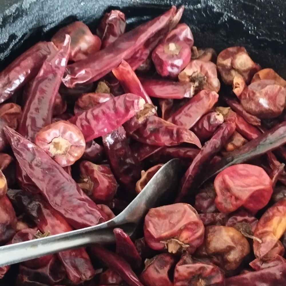 Roasting dried red chillies